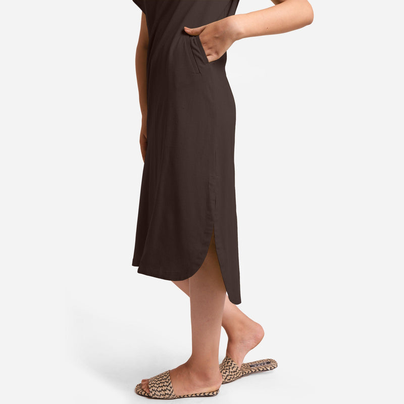 Left Detail of a Model wearing Brown Cotton Welt Pocket Shift Dress