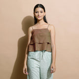 Front View of a Model wearing Brown Handspun Flared Camisole Top
