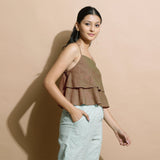 Right View of a Model wearing Brown Handspun Flared Camisole Top