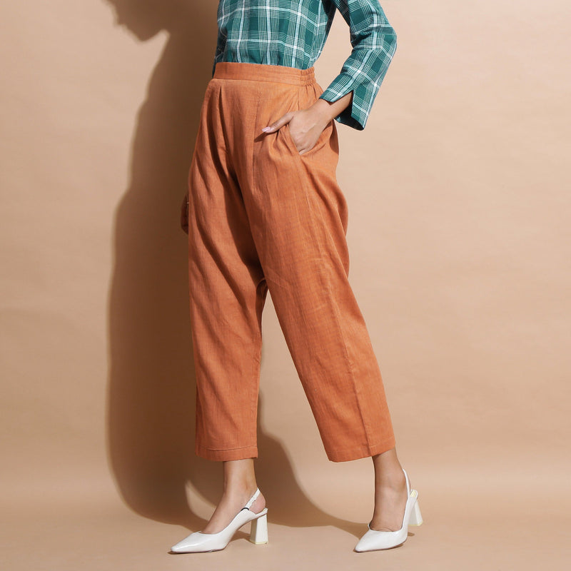 Left View of a Model wearing Brown Handspun Mid-Rise Zouave Pant