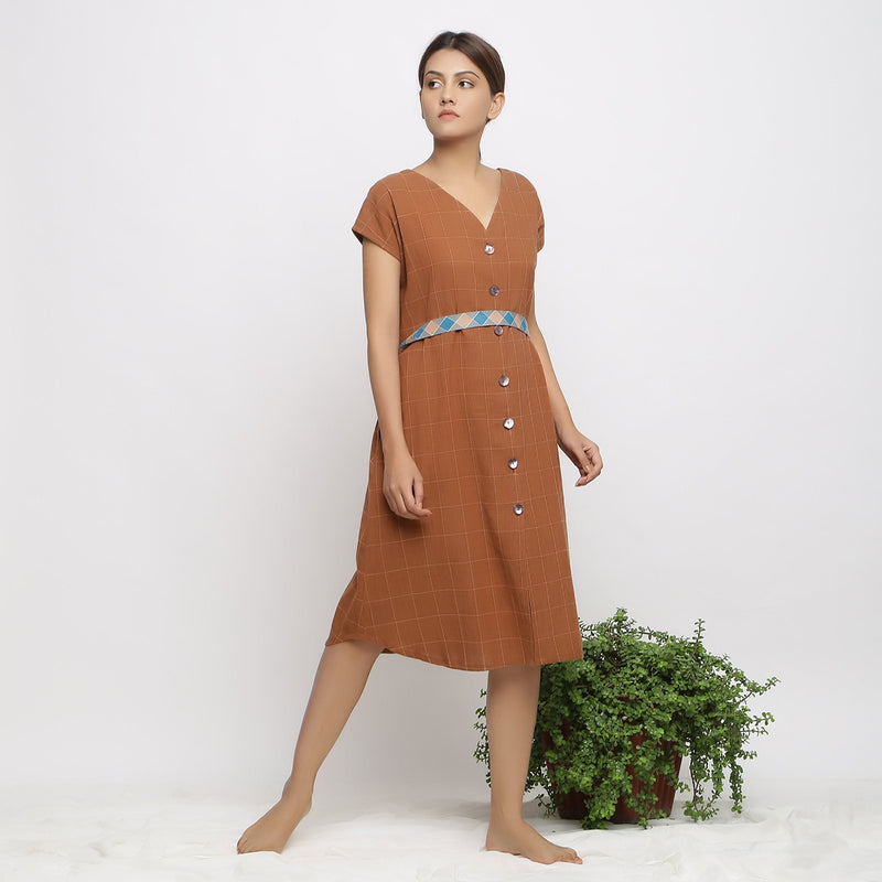Right View of a Model wearing Brown Handspun V-Neck Shift Dress