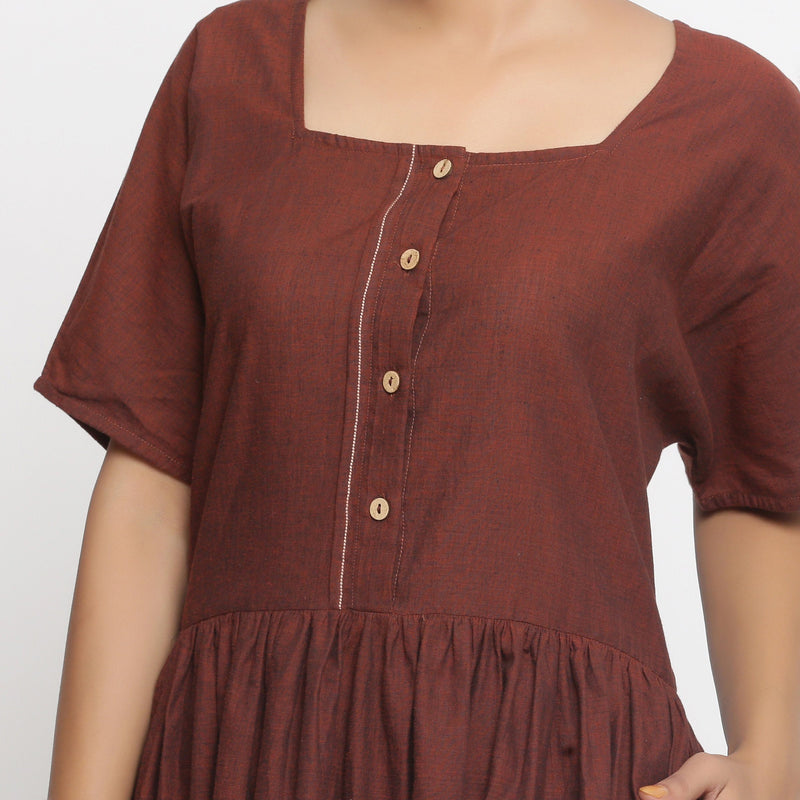 Front Detail of a Model wearing Brown Cotton Button-Down Gathered Dress