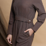 Left Detail of a Model wearing Brown Square Neck Gathered Romper
