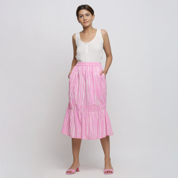 Front View of a Model wearing Bubblegum Pink Tie-Dye Cotton Elasticated Midi Balloon Skirt