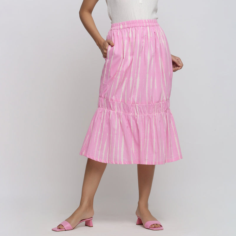 Front View of a Model wearing Bubblegum Pink Tie-Dye Cotton Elasticated Midi Balloon Skirt
