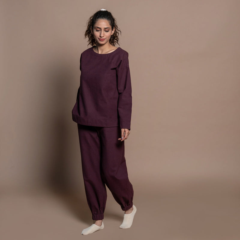 Left View of a Model wearing Burgundy Warm Cotton Flannel Jogger Pant