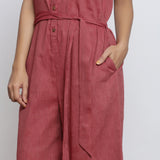 Front Detail of a Model wearing Button-Down Maroon Yoked Jumpsuit