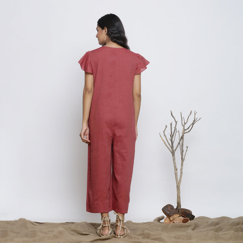 Back View of a Model wearing Button-Down Maroon Yoked Jumpsuit