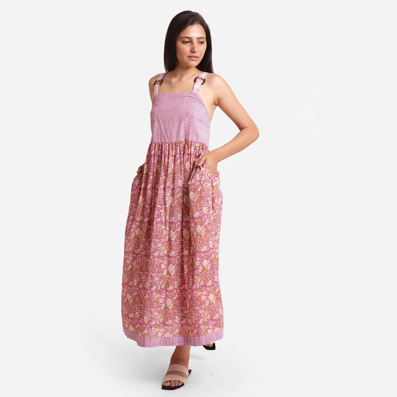 Left View of a Model wearing Floral Block Print Cotton Maxi Dress