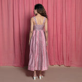 Back View of a Model wearing Pink Cotton Chanderi Block Print Paneled Maxi Dress