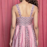 Back View of a Model wearing Pink Cotton Chanderi Block Print Paneled Maxi Dress