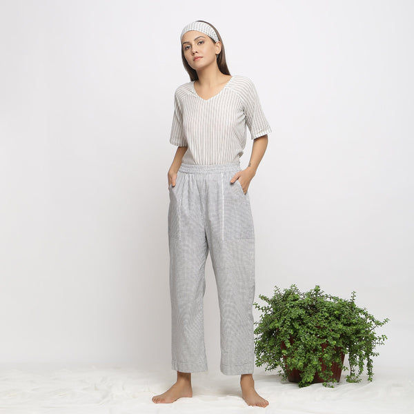 Front View of a Model wearing Off-White Checkered Cotton Muslin Elasticated Mid-Rise Pant