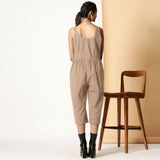 Back View of a Model wearing Beige Cotton Flax Button-Down Midi Jumpsuit