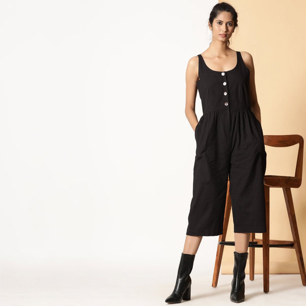Front View of a Model wearing Chic Black Cotton Button-Down Jumpsuit