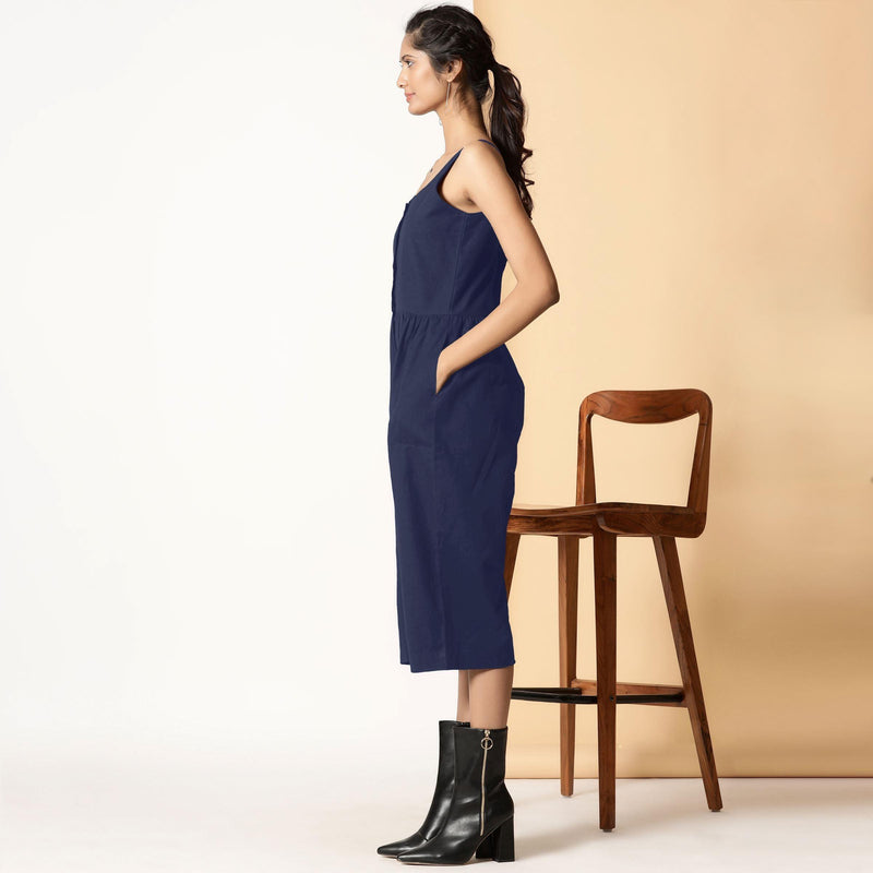 Left View of a Model wearing Navy Blue Cotton Flax Button-Down Midi Jumpsuit
