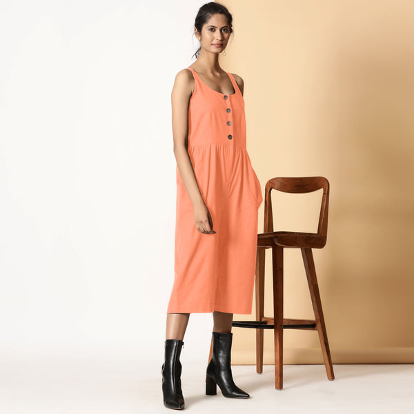 Right View of a Model wearing Peach Cotton Flax Button-Down Midi Jumpsuit