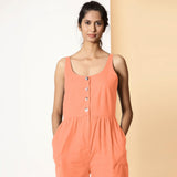 Front Detail of a Model wearing Peach Cotton Flax Button-Down Midi Jumpsuit