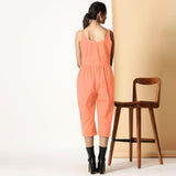 Back View of a Model wearing Peach Cotton Flax Button-Down Midi Jumpsuit