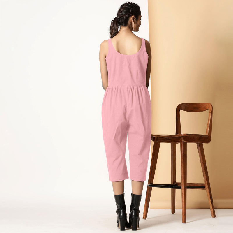 Back View of a Model wearing Chic Pink Cotton Button-Down Jumpsuit