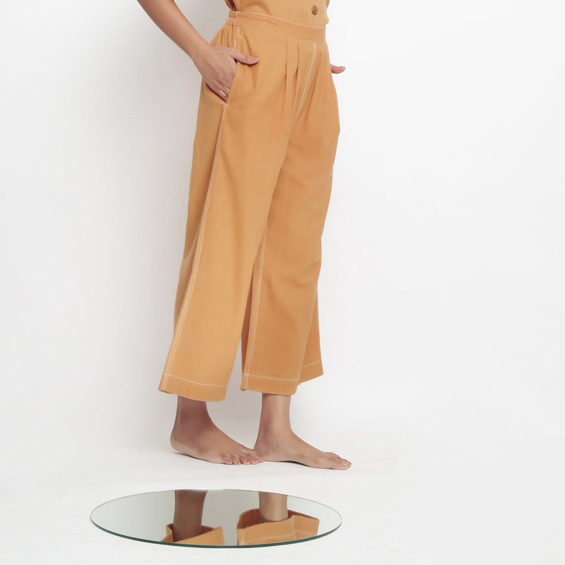 Right View of a Model wearing Vegetable Dyed Rustic Wide Legged Pant