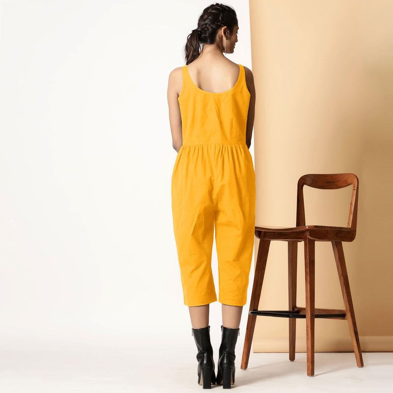 Back View of a Model wearing Yellow Cotton Flax Button-Down Midi Jumpsuit