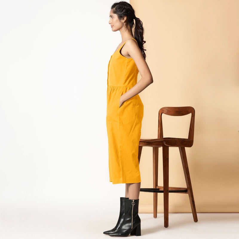 Left View of a Model wearing Yellow Cotton Flax Button-Down Midi Jumpsuit