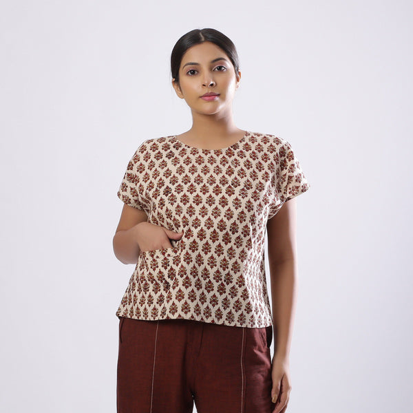 Front View of a Model wearing Beige Block Print Floral Loose Fit Top