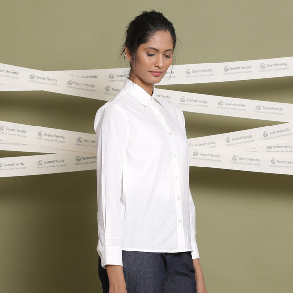 Right View of a Model wearing Classic White Cotton Button-Down Shirt