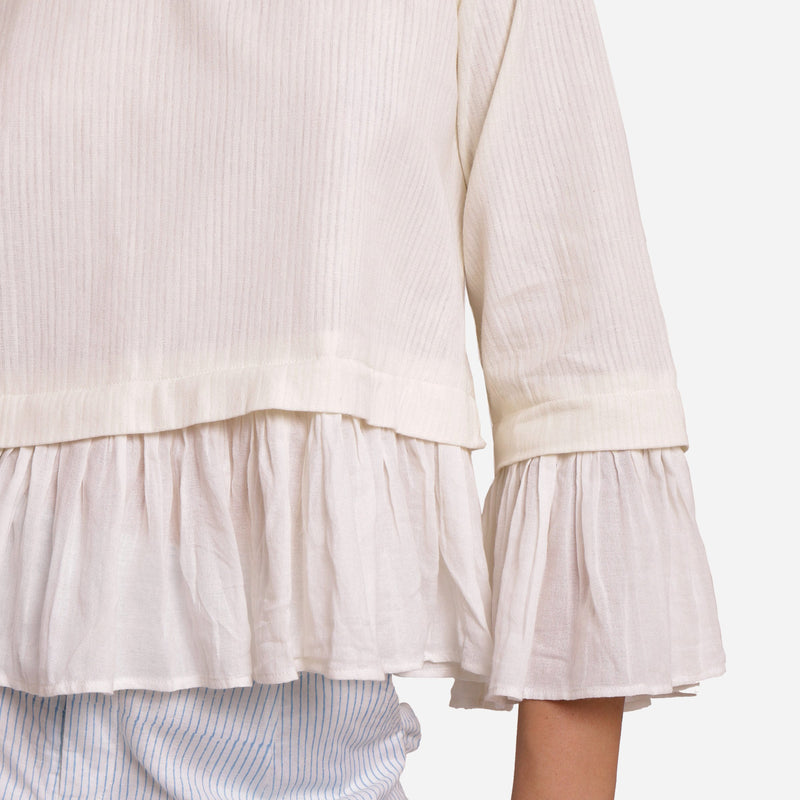 Close View of a Model wearing White Frilled Cotton Peplum Top