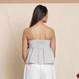 Back View of a Model wearing Cloudy Grey Yarn Dyed Cotton Striped Yoked Top
