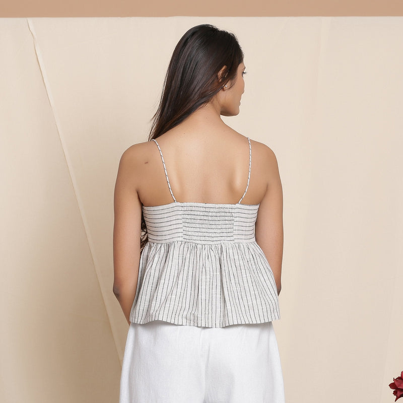 Back View of a Model wearing Cloudy Grey Yarn Dyed Cotton Striped Yoked Top