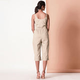 Back View of a Model wearing Beige Cotton Sleeveless Button-Down Jumpsuit