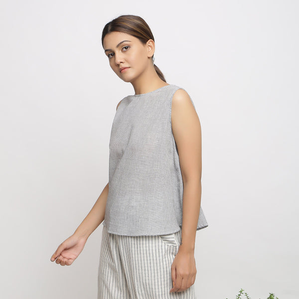Left View of a Model wearing Off-White Cotton Checkered Flared Top