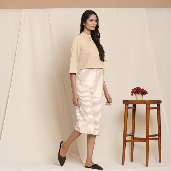 Right View of a Model wearing Beige Warm Cotton Flannel Knee Length Yoked Jumpsuit