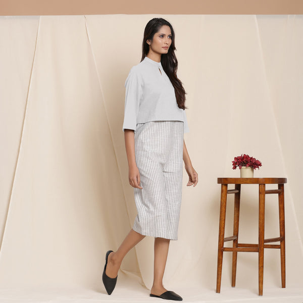 Right View of a Model wearing Comfy Cotton Cloudy Grey Yoked Jumpsuit