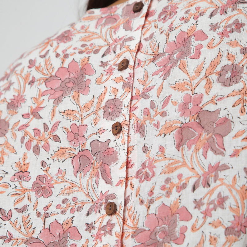 Back Detail of a Model wearing White Floral Printed Sleeveless Top