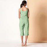 Back View of a Model wearing Green Cotton Sleeveless Button-Down Jumpsuit