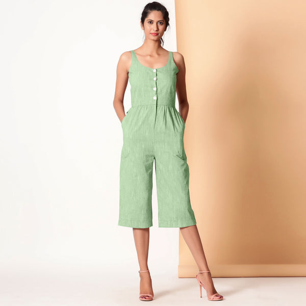 Front View of a Model wearing Green Cotton Sleeveless Button-Down Jumpsuit