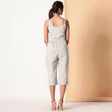 Back View of a Model wearing Grey Cotton Sleeveless Button-Down Jumpsuit