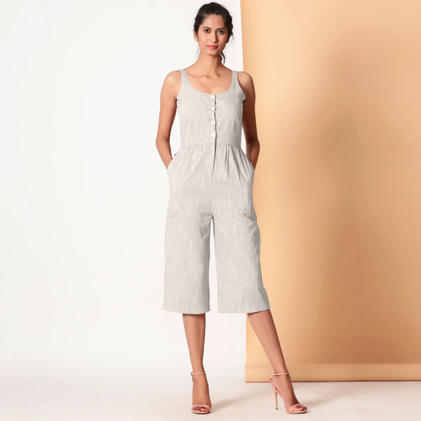 Front View of a Model wearing Grey Cotton Sleeveless Button-Down Jumpsuit