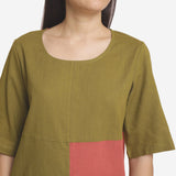 Front Detail of a Model wearing Khaki Green and Brick Red Relaxed Fit Top
