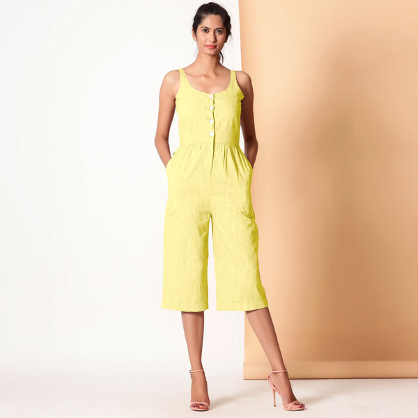 Front View of a Model wearing Lemon Yellow Cotton Sleeveless Button-Down Jumpsuit