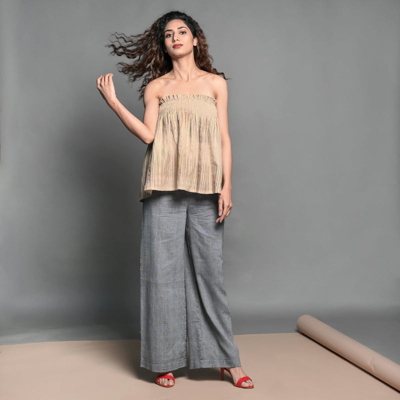 Front View of a Model wearing Convertible Beige Handwoven Cotton Shirred Top Skirt