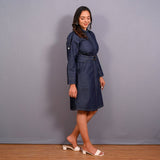 Right View of a Model wearing Convertible Indigo Cotton Denim Button-Down Overlay Dress