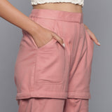 Right Detail of a Model wearing Pink Flannel Convertible Pant Shorts