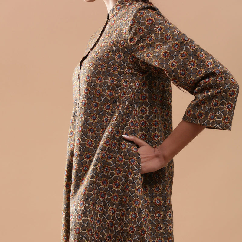 Left View of a Model wearing Convertible Warm Kalamkari Short Overlay Dress