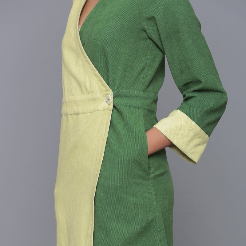Left Detail of a Model wearing Cotton Corduroy V-Neck Wrap Dress
