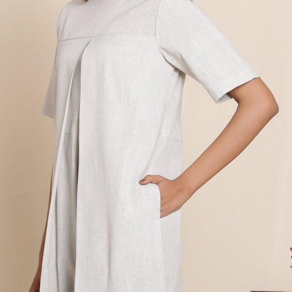 Front Detail of a Model wearing Cotton Cloudy Grey Box Pleated Jumpsuit