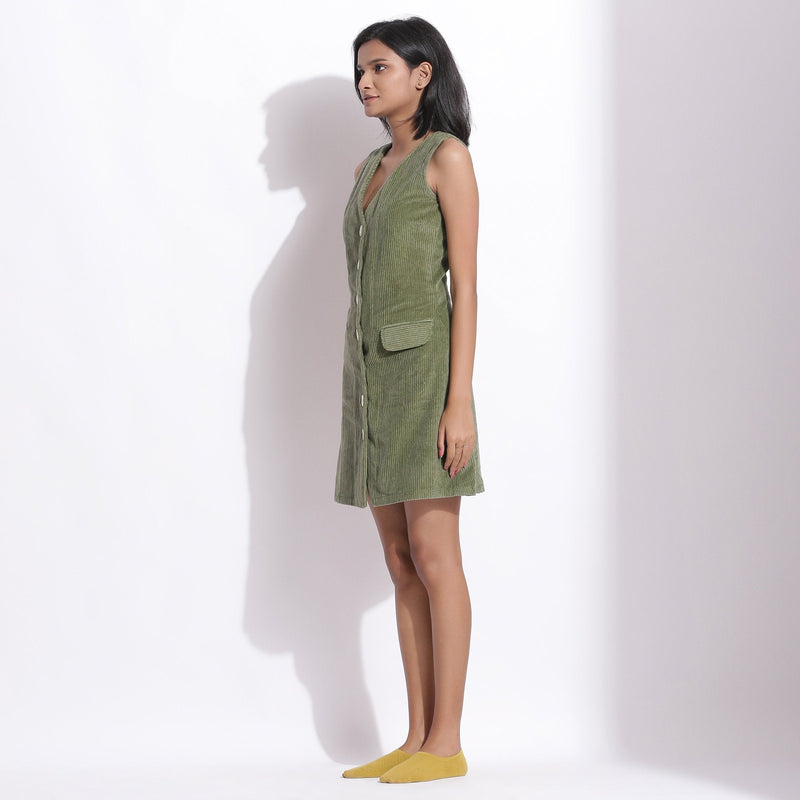 Left View of a Model wearing Green Warm Cotton Corduroy Sleeveless Short Dress