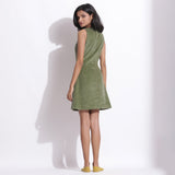 Back View of a Model wearing Green Warm Cotton Corduroy Sleeveless Short Dress